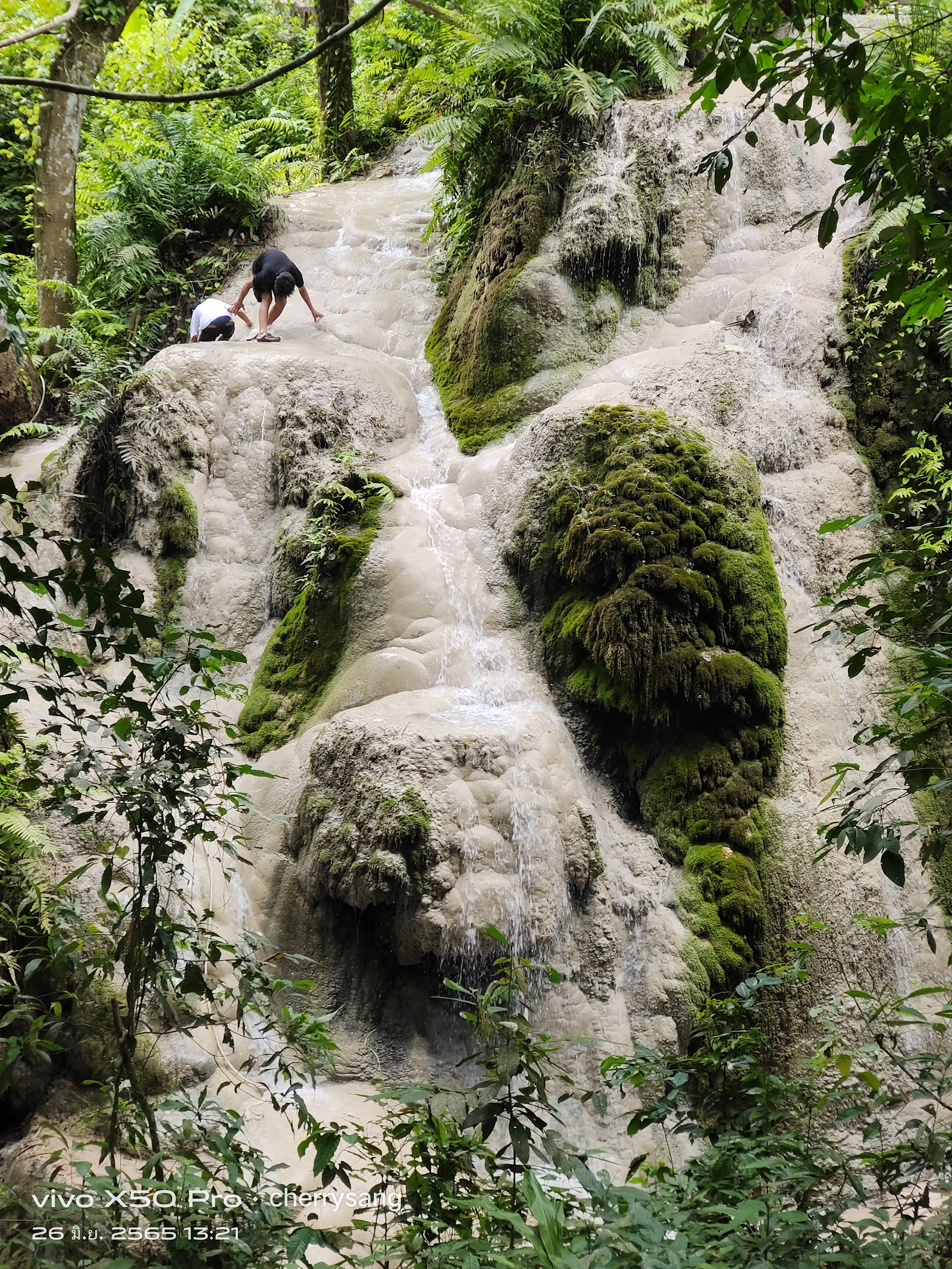 Climbing the sticky waterfall at Bua Thong