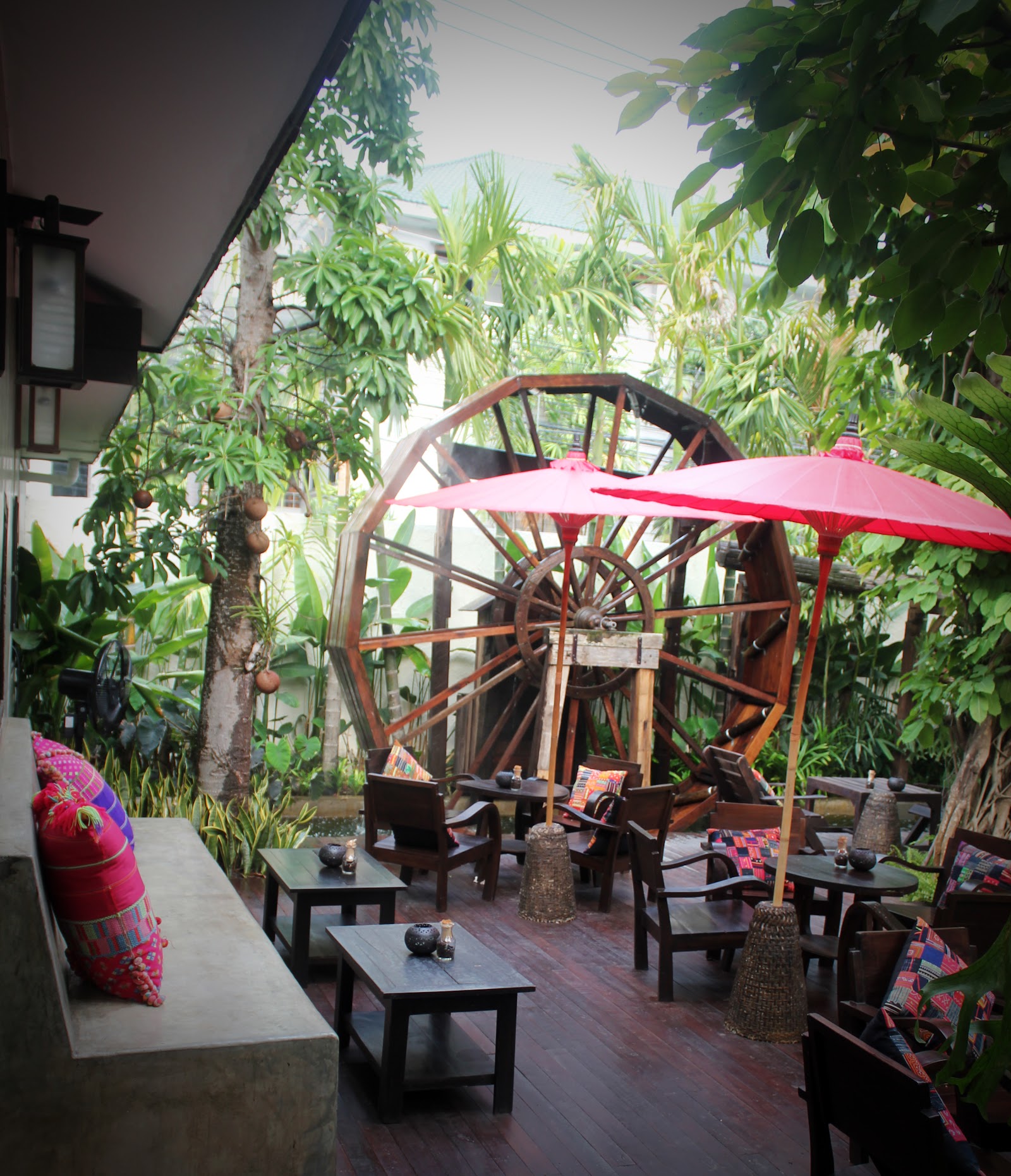 Garden and water wheel at Fahtara Coffee, Chiang Mai